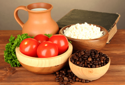 tomatoes, coffee beans, rice and a history book