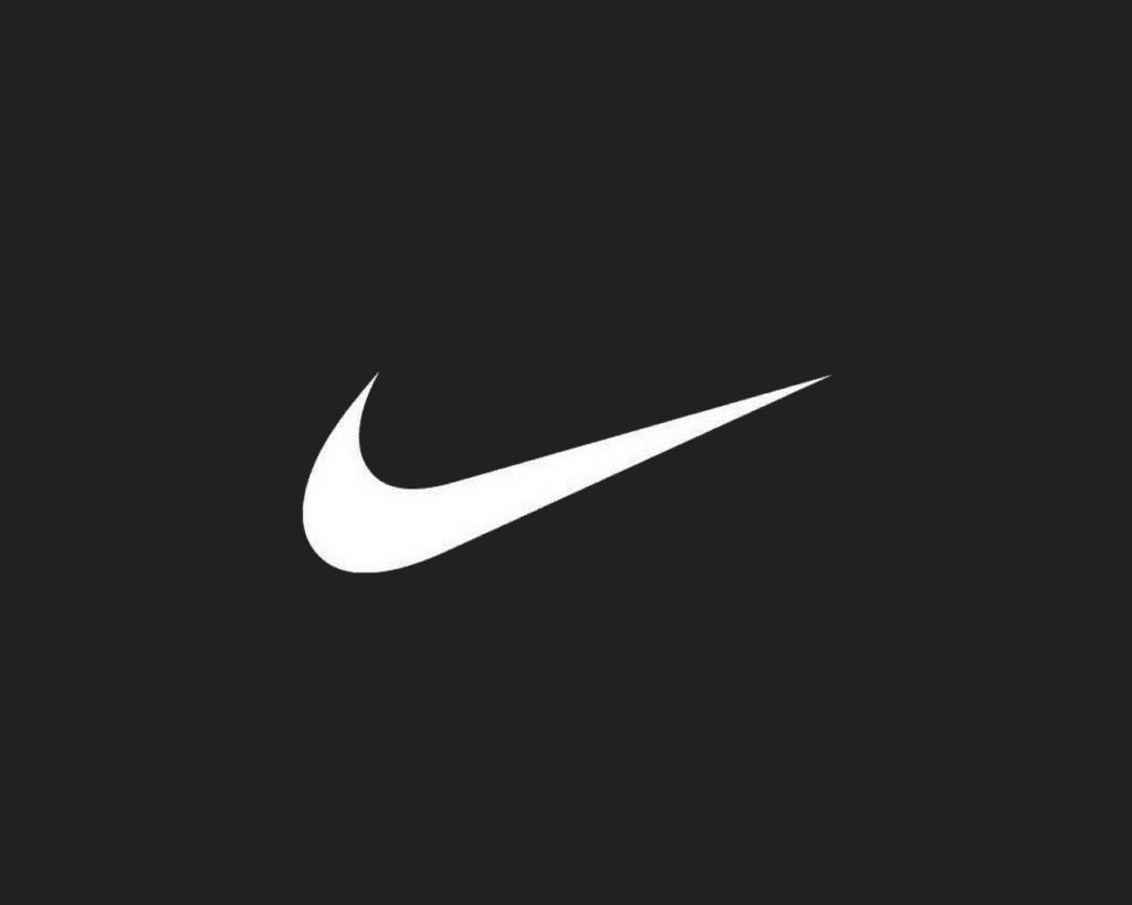 A clean and minimalist image features the iconic white Nike "swoosh" brands logo prominently centered against a solid dark gray or black background.