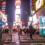 new york with robots walking in time square, and hologram screens