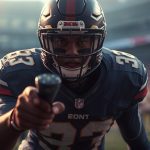 Intense close-up of an American football player in a dark uniform and helmet, pointing directly at the camera on the field during a big game in a packed stadium.