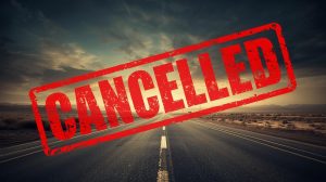 A long desert road under a dramatic sky, representing the "roads not taken" in Call of Duty history, is stamped with a large red "CANCELLED" logo, symbolizing the 10 cancelled Call of Duty projects.